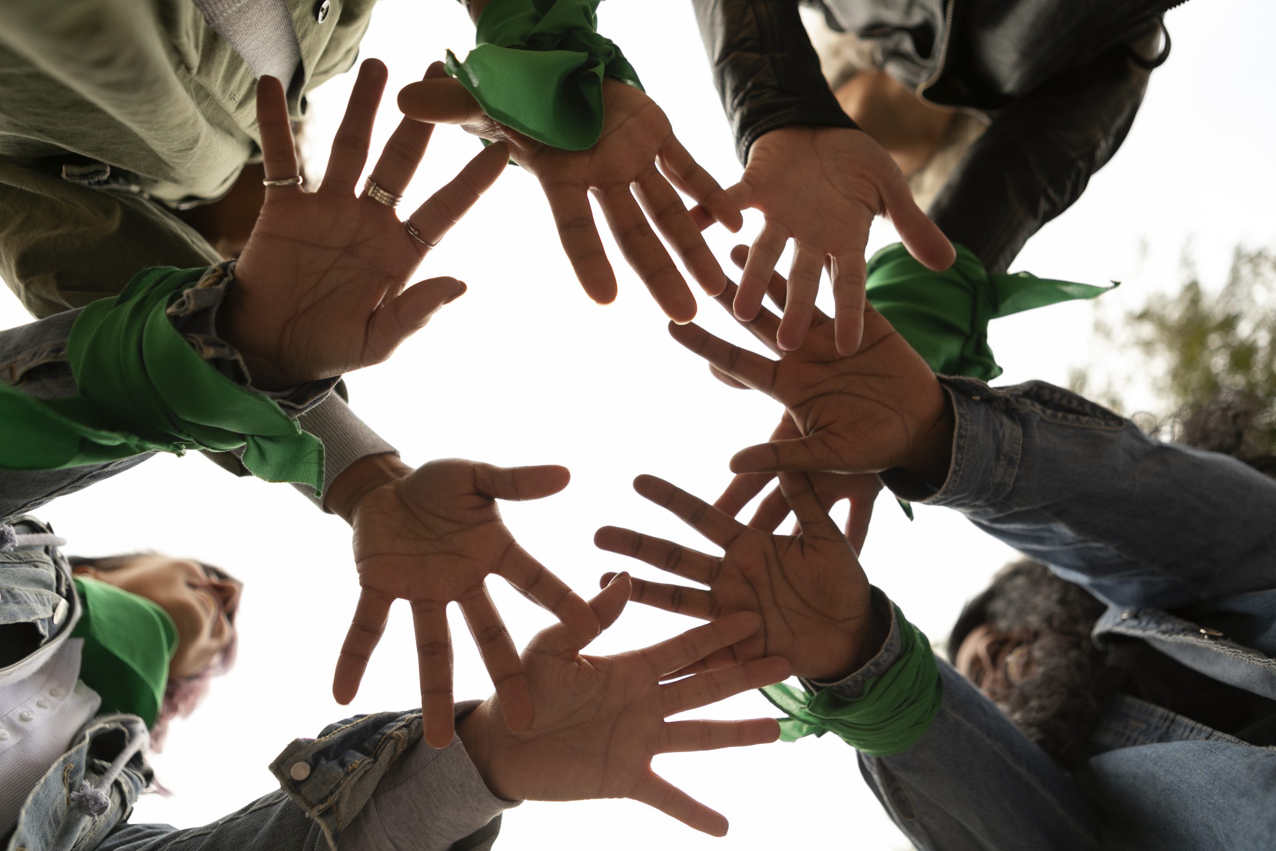 bottom view women protesting outdoors